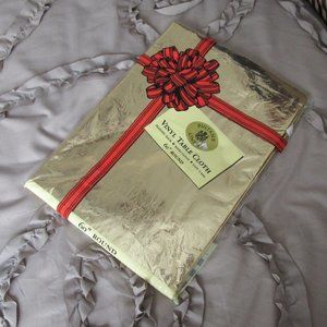 NIB shiny gold vinyl tablecloth